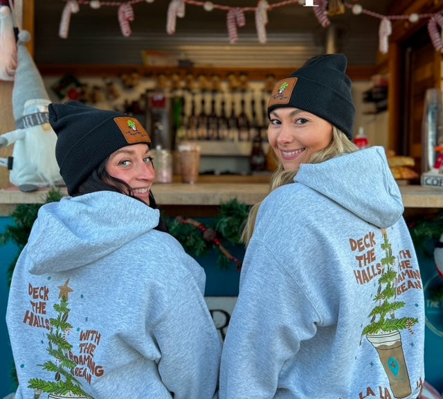 The Roaming Bean Coffee Shop branded beanie and sweatshirt collection.